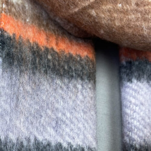 Leuke gestreepte wintersjaal in paars, oranje, bruin en creme