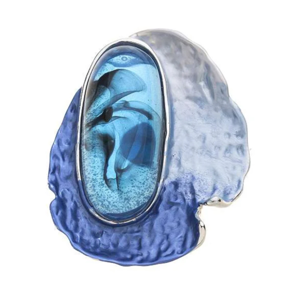 magneetbroche judith blauw mooie blauwe magneetbroche met zilverkleurige accenten en een grote steen.