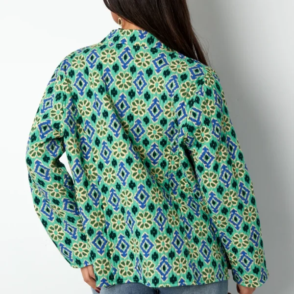 Blauw groen jasje met geometrische print Dubbelzijdig jasje met geometrisch patroon