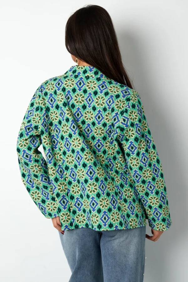 Blauw groen jasje met geometrische print Dubbelzijdig jasje met geometrisch patroon