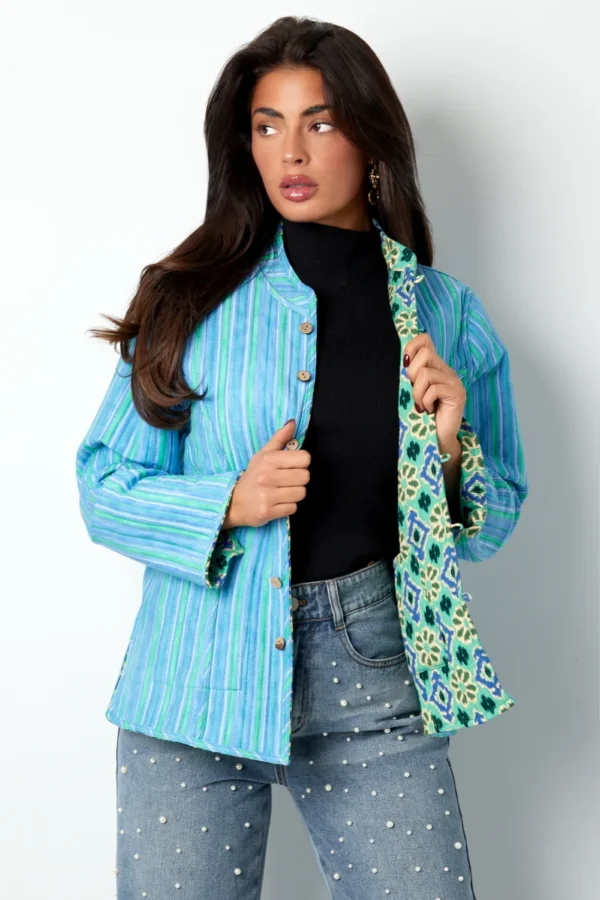 Blauw groen jasje met geometrische print Dubbelzijdig jasje met geometrisch patroon