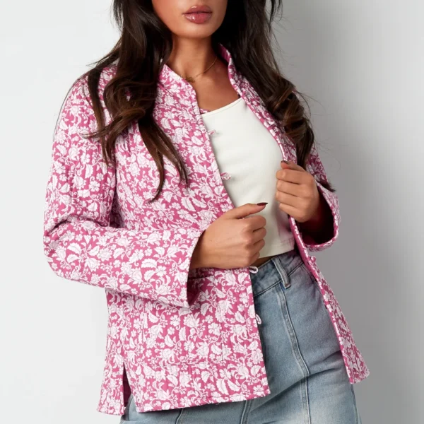 roze jasje met bloempatroon Roze dubbelzijdig jasje met bloemenprint